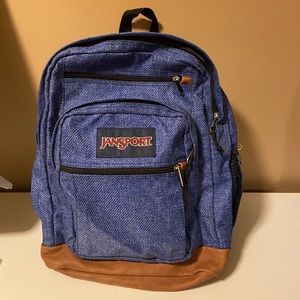 Blue Jansport backpack with Leather bottom